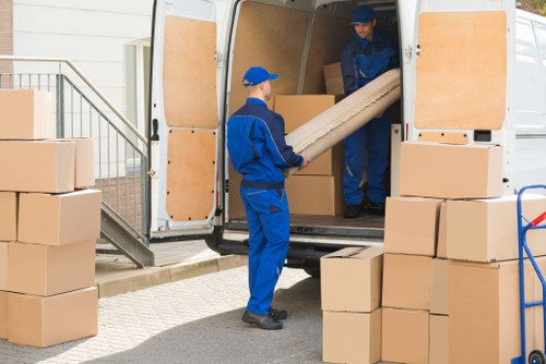 Moving van and packed boxes for house removals in Cubitttown