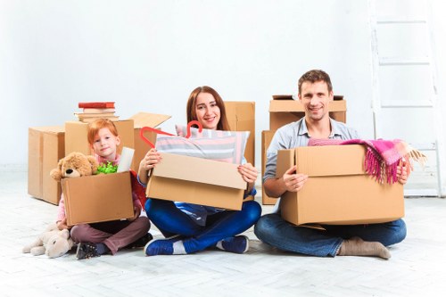 Removals and storage services in Cubitt Town with moving boxes and transport