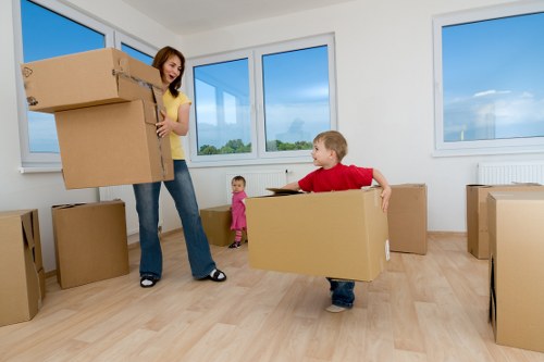 Loading boxes into a mobile storage unit in Cubitttown