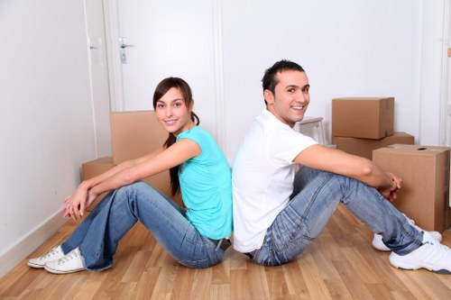 Local Cubitt Town movers handling household furniture and boxes