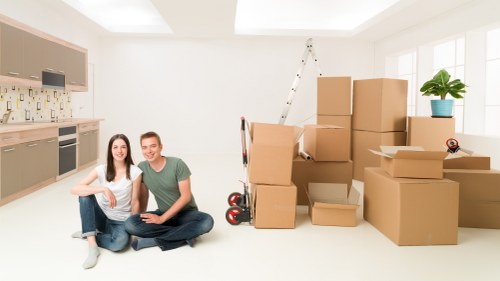 Packed office supplies and labelled boxes ready for a commercial relocation in Cubitttown